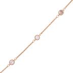 Minimal chain bracelet featuring evenly spaced round stones