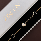 Heart charm bracelet displayed in Zircon Jewels gift box