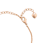 Adjustable extension chain with heart-shaped end charm on a white background