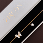 Butterfly and pearl bracelet displayed in Zircon Jewels gift box