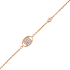 Delicate chain bracelet featuring square pavé detail in oval setting on a white background