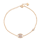 18K gold-plated bracelet with pavé square charm in oval frame on a white background