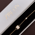 Bracelet with pave square centre inside oval frame displayed in Zircon Jewels gift box