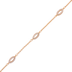 Delicate chain bracelet featuring open pavé oval charms on a white background