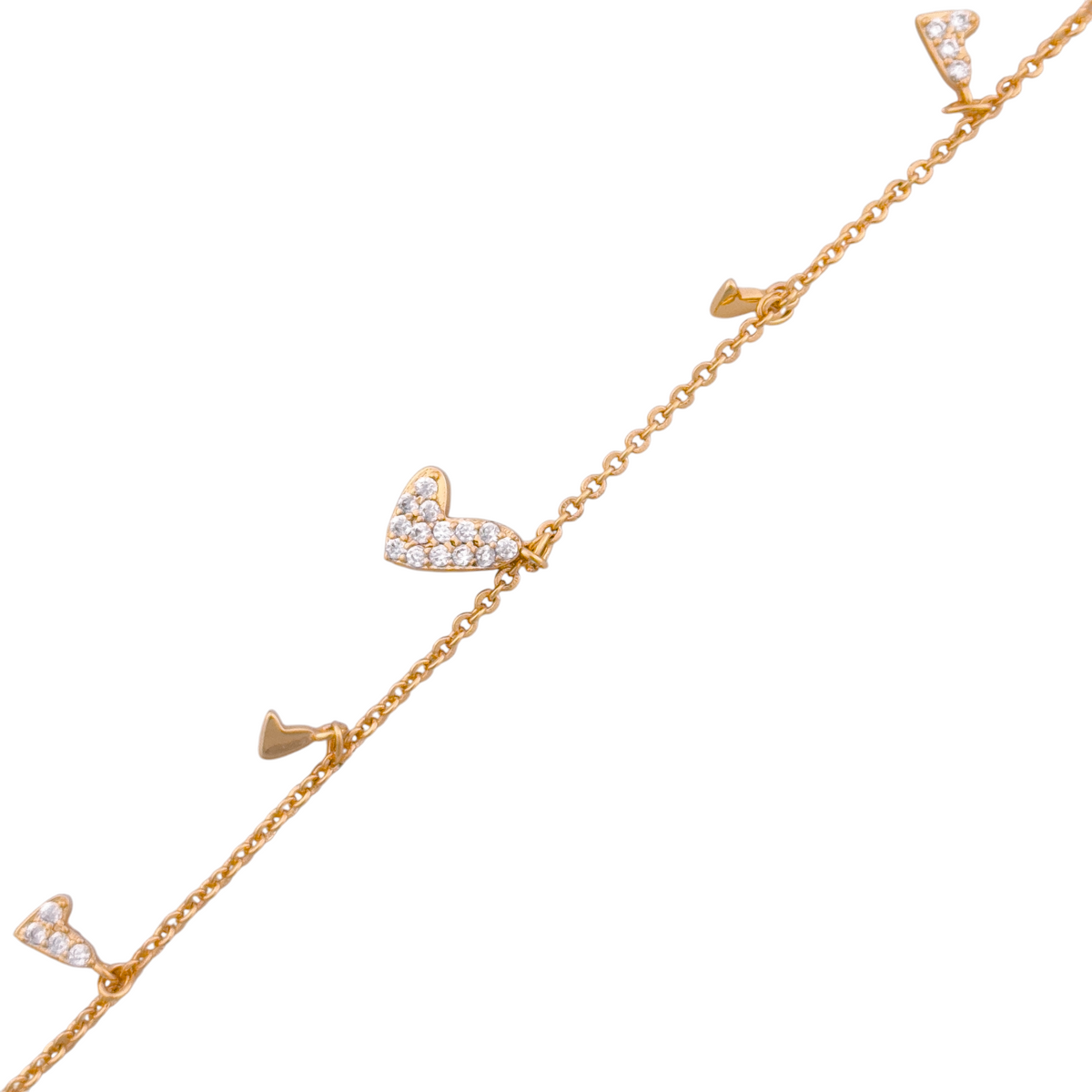 Delicate chain bracelet with mixed mini heart charms on a white background