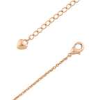Lobster clasp and adjustable chain detail on gold bracelet on a white background
