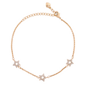 18K gold-plated star charm bracelet with pavé stones on a white background