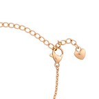 Adjustable gold bracelet chain close-up on a white background