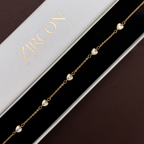 Gold heart stone bracelet displayed in Zircon Jewels gift box