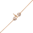 Delicate chain bracelet with two pavé heart charms on a white background
