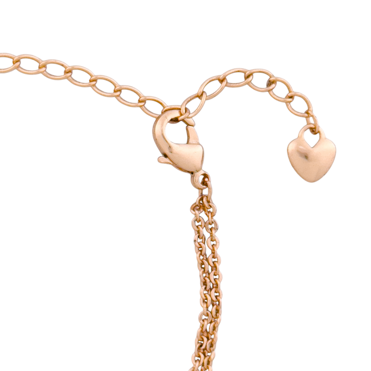 Adjustable extension chain with heart charm on layered bracelet