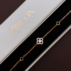 Gold clover bracelet displayed in Zircon Jewels gift box