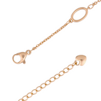 Lobster clasp detail on adjustable gold bracelet on a white background