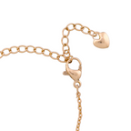 Adjustable extension chain with heart charm on bracelet on a white background