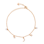 18K gold-plated celestial charm bracelet with crescent moon and star accents on a white background