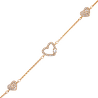 18K gold-plated pavé heart charm bracelet with open heart center design on a white background