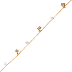 18k Gold bracelet with small square and round pendants on a white background