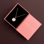 Round clear stone halo pendant necklace in a Zircon Jewels gift box