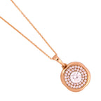 Close-up of the round clear stone halo pendant detail