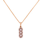 Gold-plated necklace with a vertical pendant featuring three stones surrounded by a clear stone halo on a white background