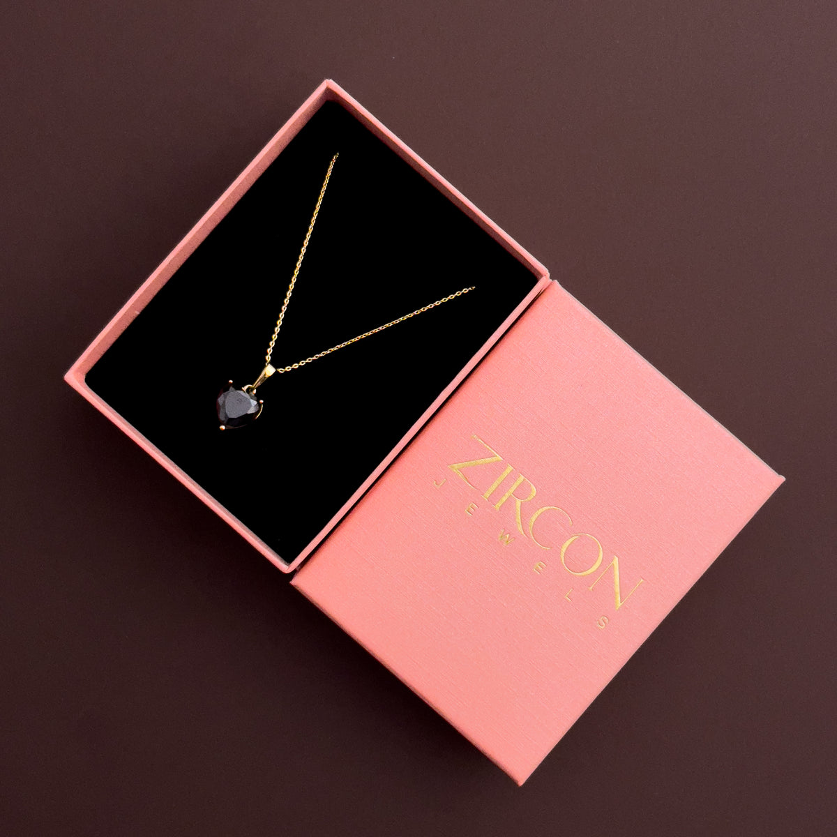 Black heart stone pendant necklace in a Zircon Jewels gift box