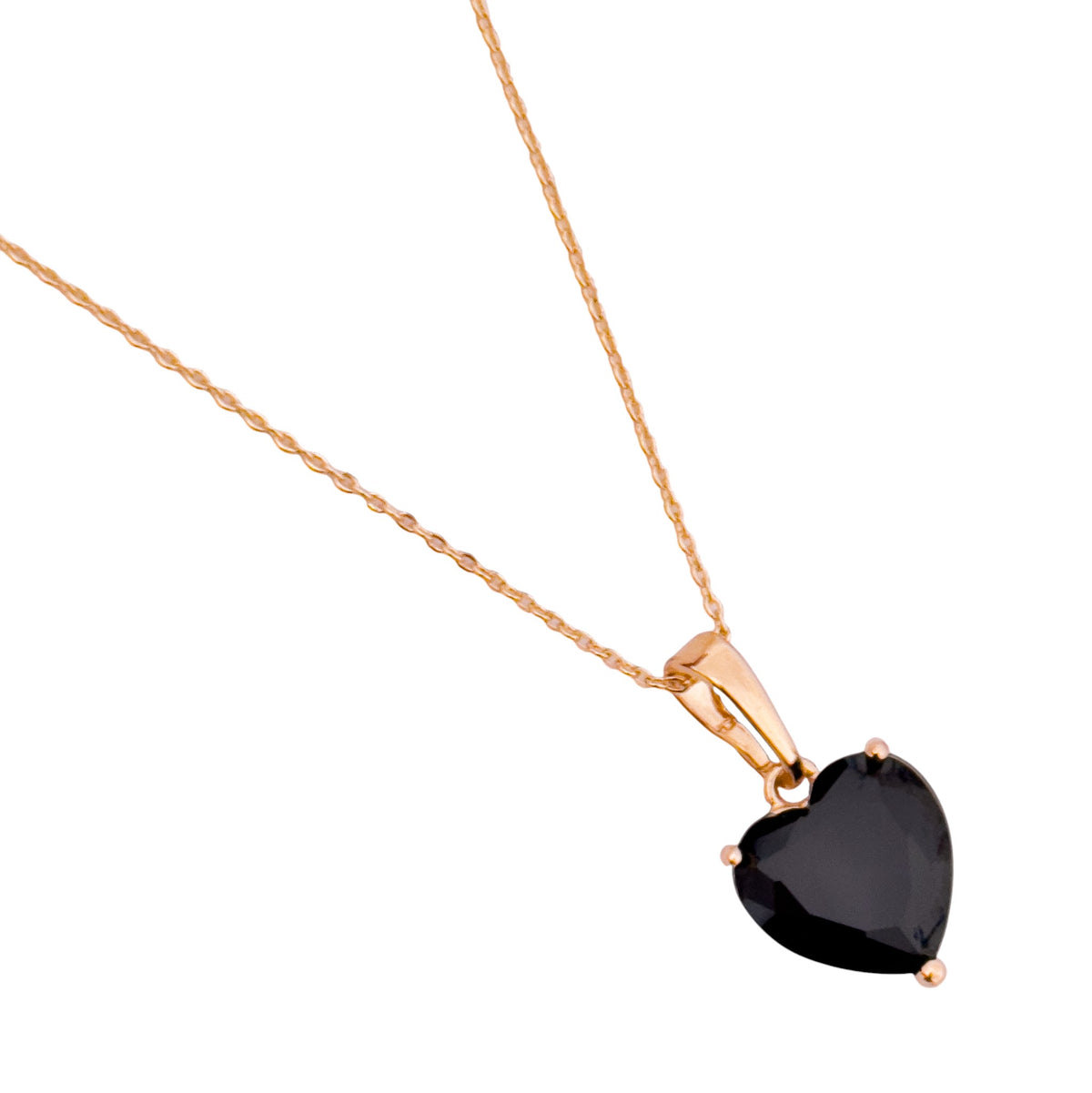 Close-up of the heart-shaped pendant detail with a black stone