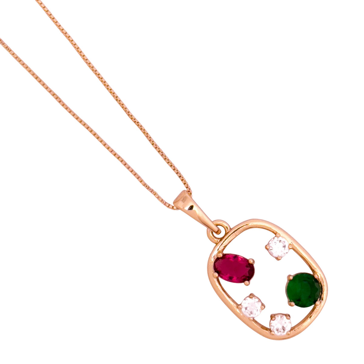 Close-up of the open geometric pendant detail with red and green stones