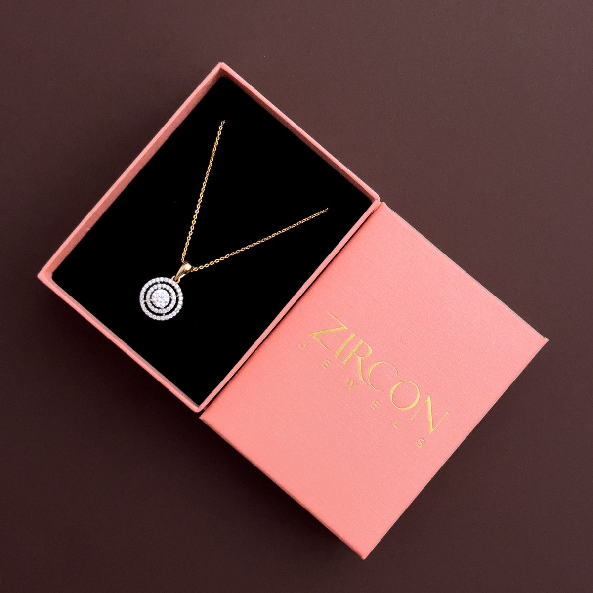 Double-halo round solitaire pendant necklace in a Zircon Jewels gift box