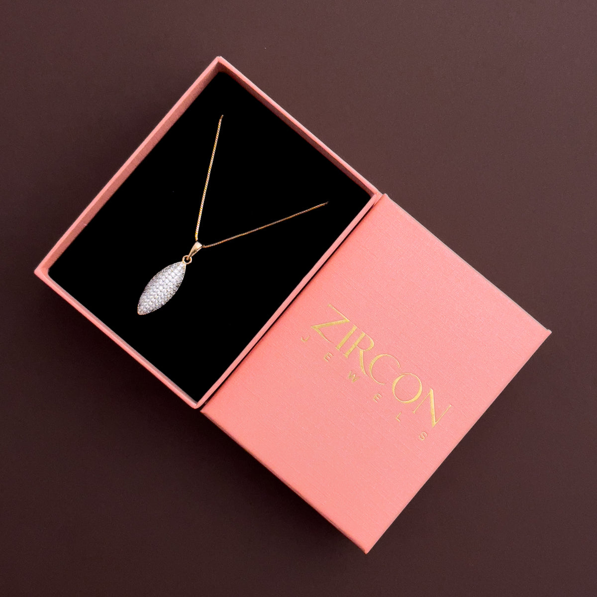 Pavé marquise pendant necklace displayed inside a Zircon Jewels gift box