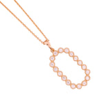 Close-up of the oval pavé link pendant detail