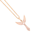 Close-up of the winged pendant and pavé detail