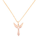 Gold-plated winged pendant necklace with pavé detailing on a white background
