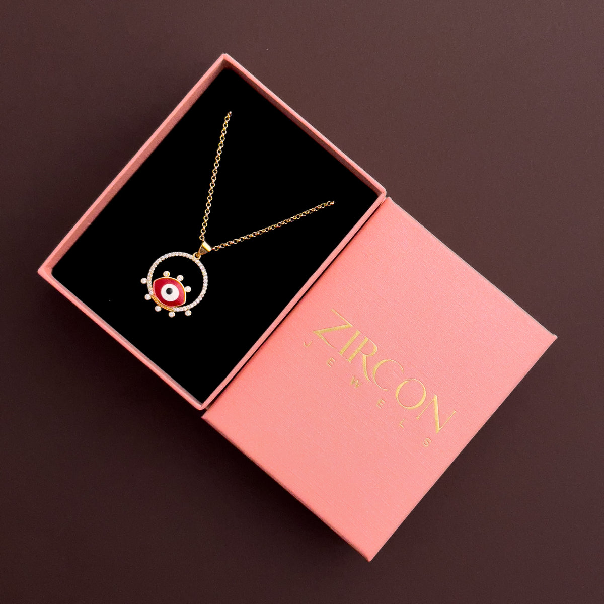 Red evil eye pendant necklace in a Zircon Jewels gift box