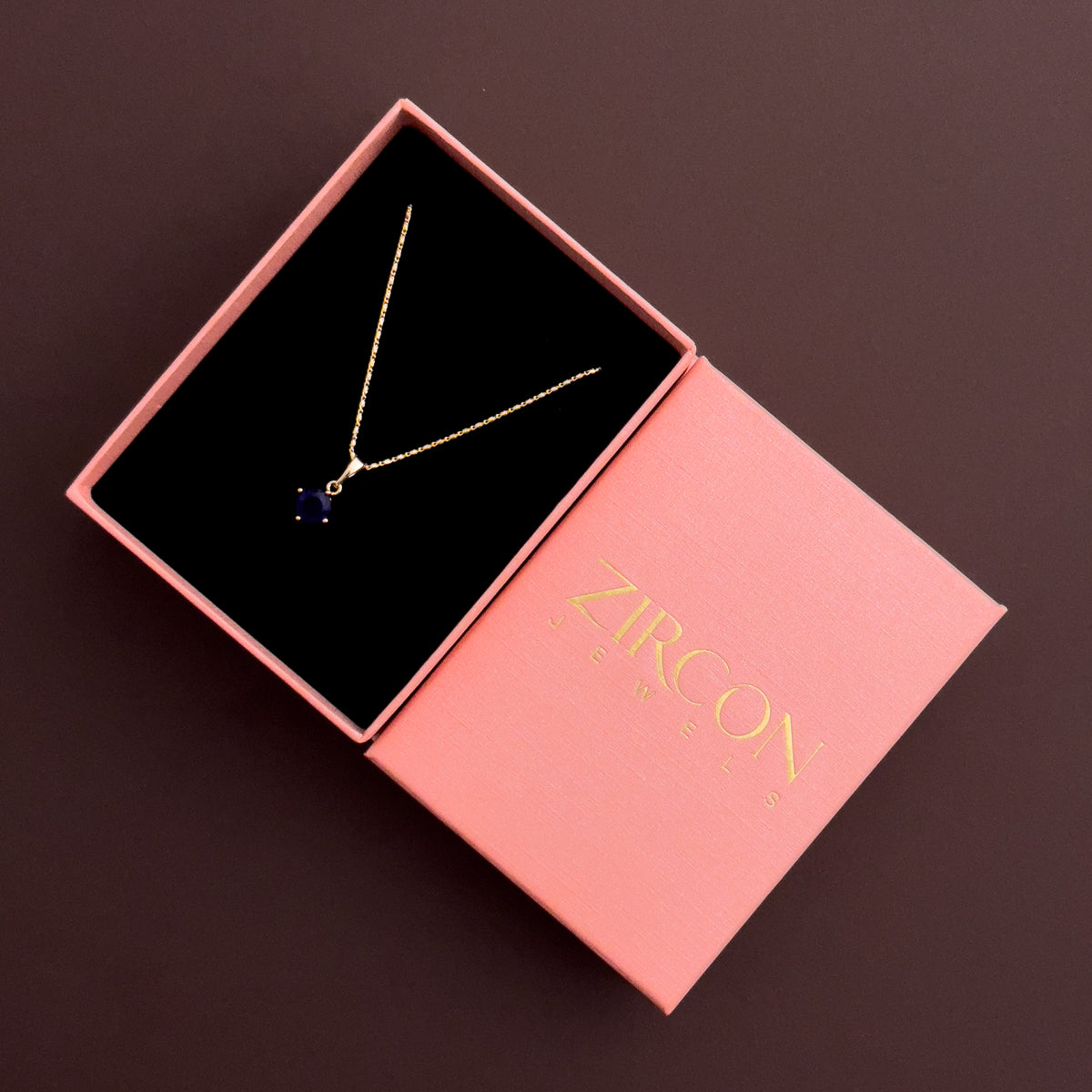Royal blue stone pendant necklace in a Zircon Jewels gift box