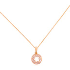 Gold-plated necklace with a pavé circle pendant and star cutout on a white background