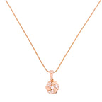 Gold-plated necklace with a floral swirl pendant and clear stones on a white background