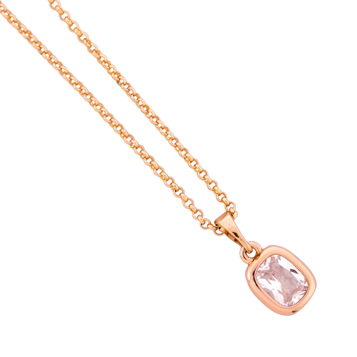 Close-up of the cushion-cut solitaire pendant and bezel detail