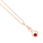 Close-up of the infinity drop pendant with red enamel detail