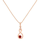 Gold-plated infinity drop pendant necklace with a red gemstone accent on a white background