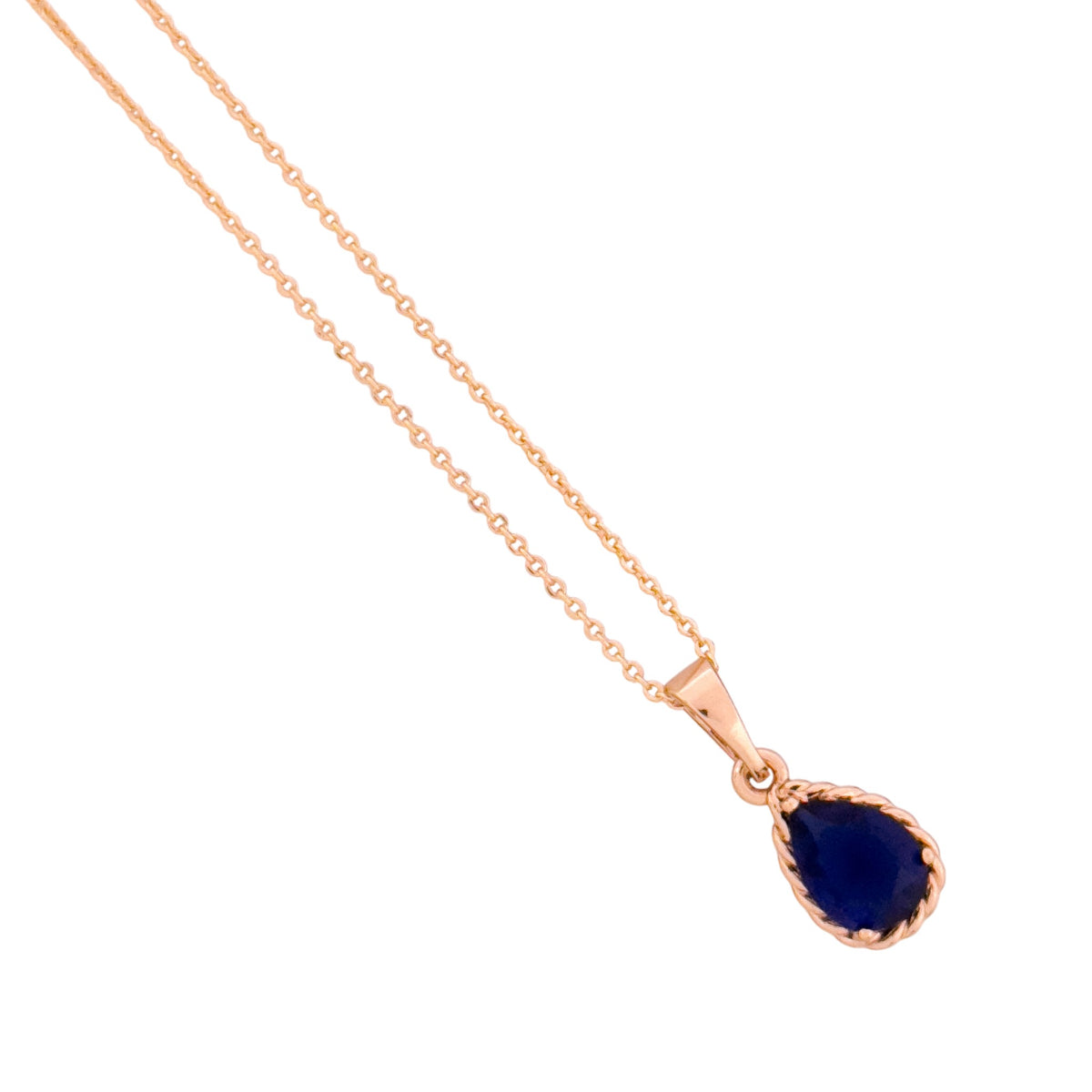Close-up of the teardrop stone pendant detail