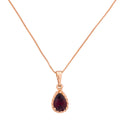 Gold-plated teardrop pendant necklace with a deep red stone on a white background