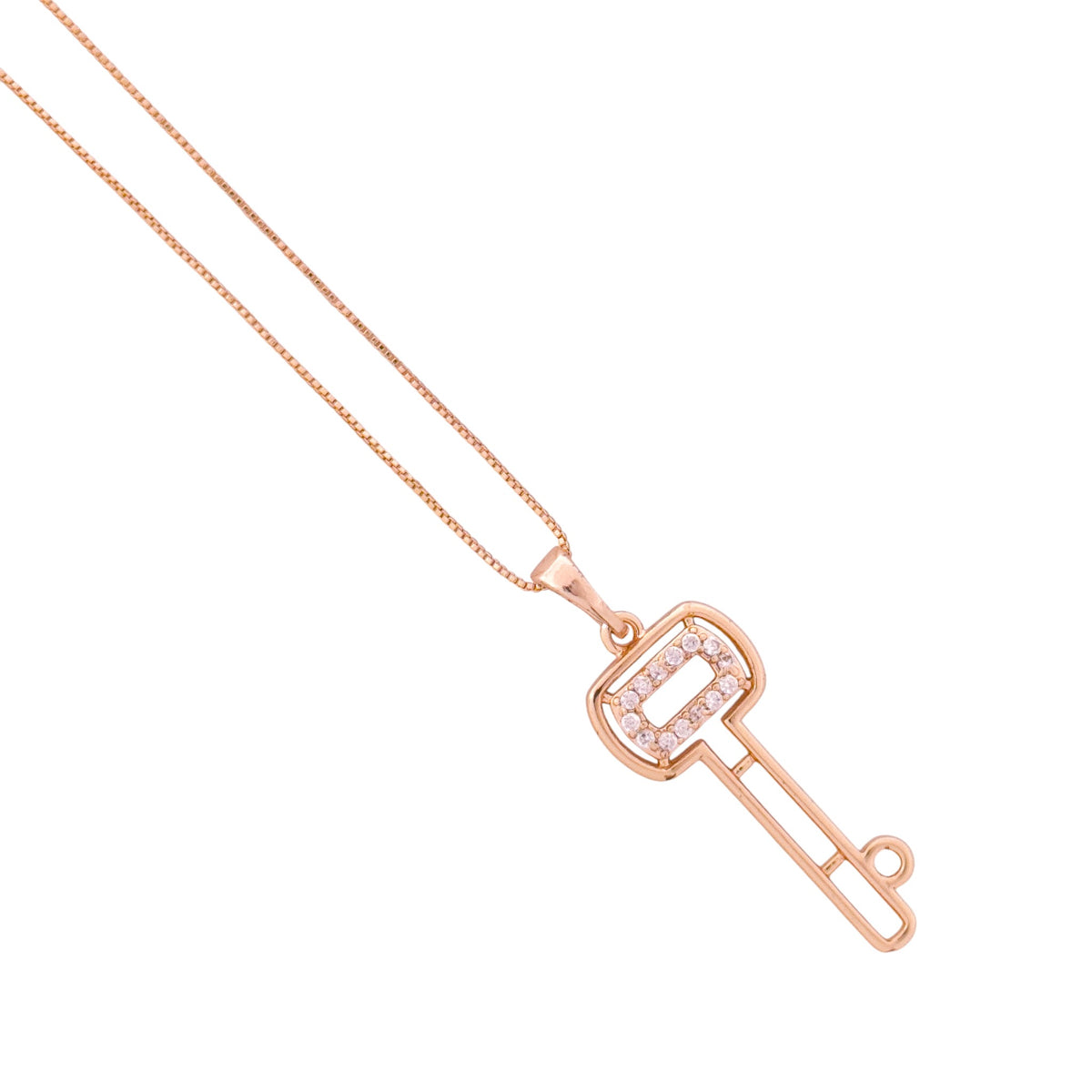 Close-up of the openwork key pendant and pavé detail