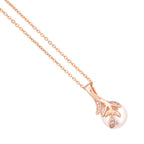 Close-up of the leaf pendant and pearl detail