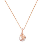 Gold-plated leaf pendant necklace with a pearl drop on a white background