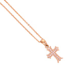 Close-up of the pavé cross pendant detail