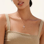 Cross pendant necklace worn on the neck