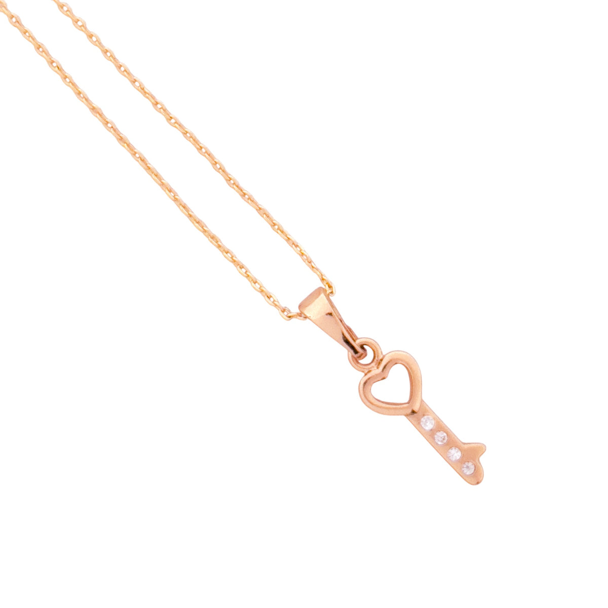Close-up of the heart-shaped key pendant detail