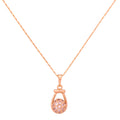 18k gold necklace with a pavé drop pendant on a white background