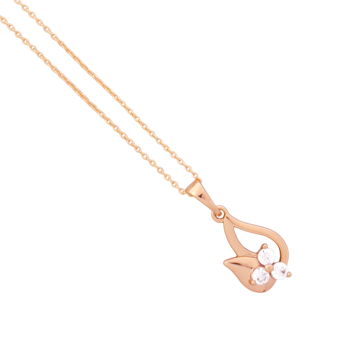 Close-up of the teardrop pendant and three-stone detail