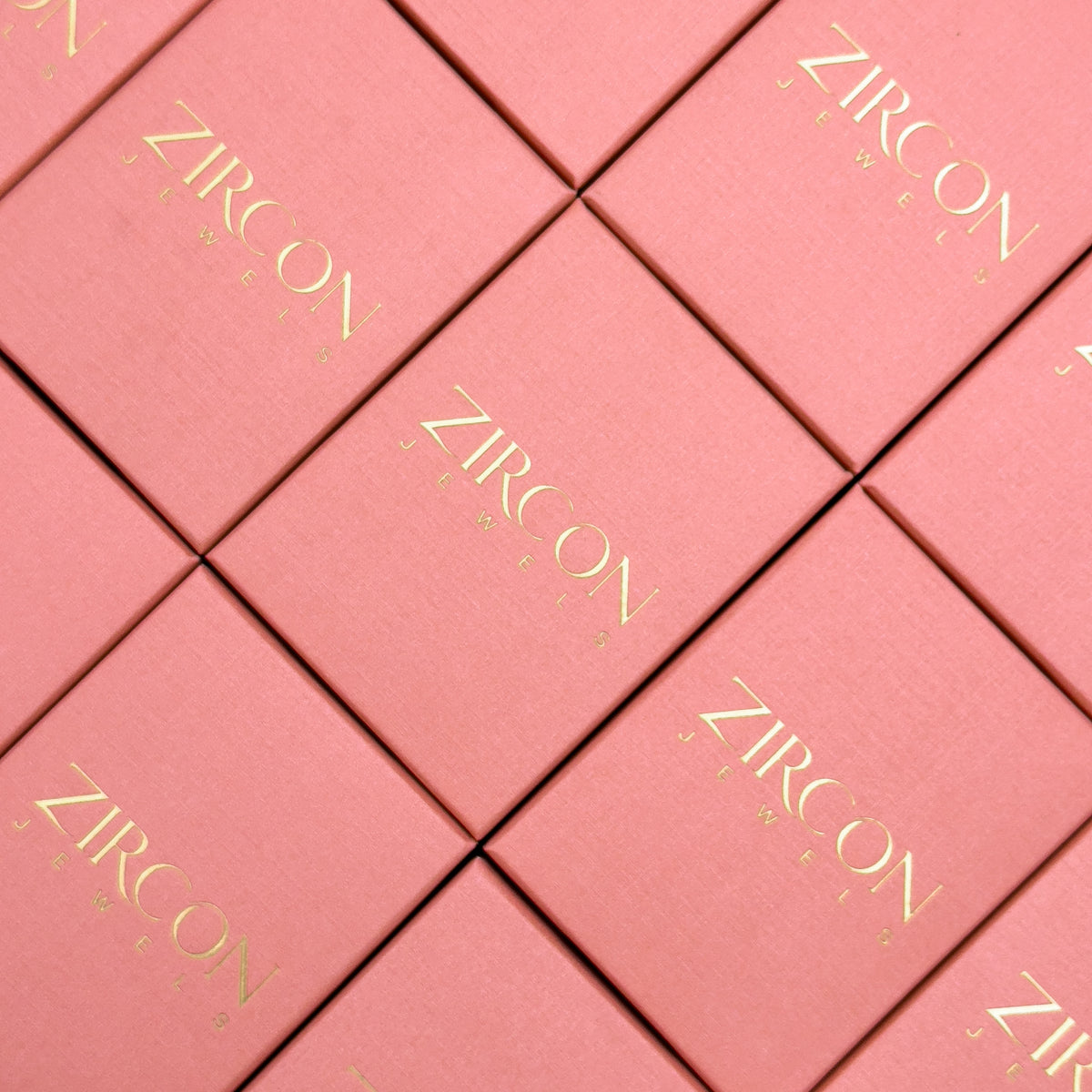 Zircon Jewels gift boxes stacked in a pattern